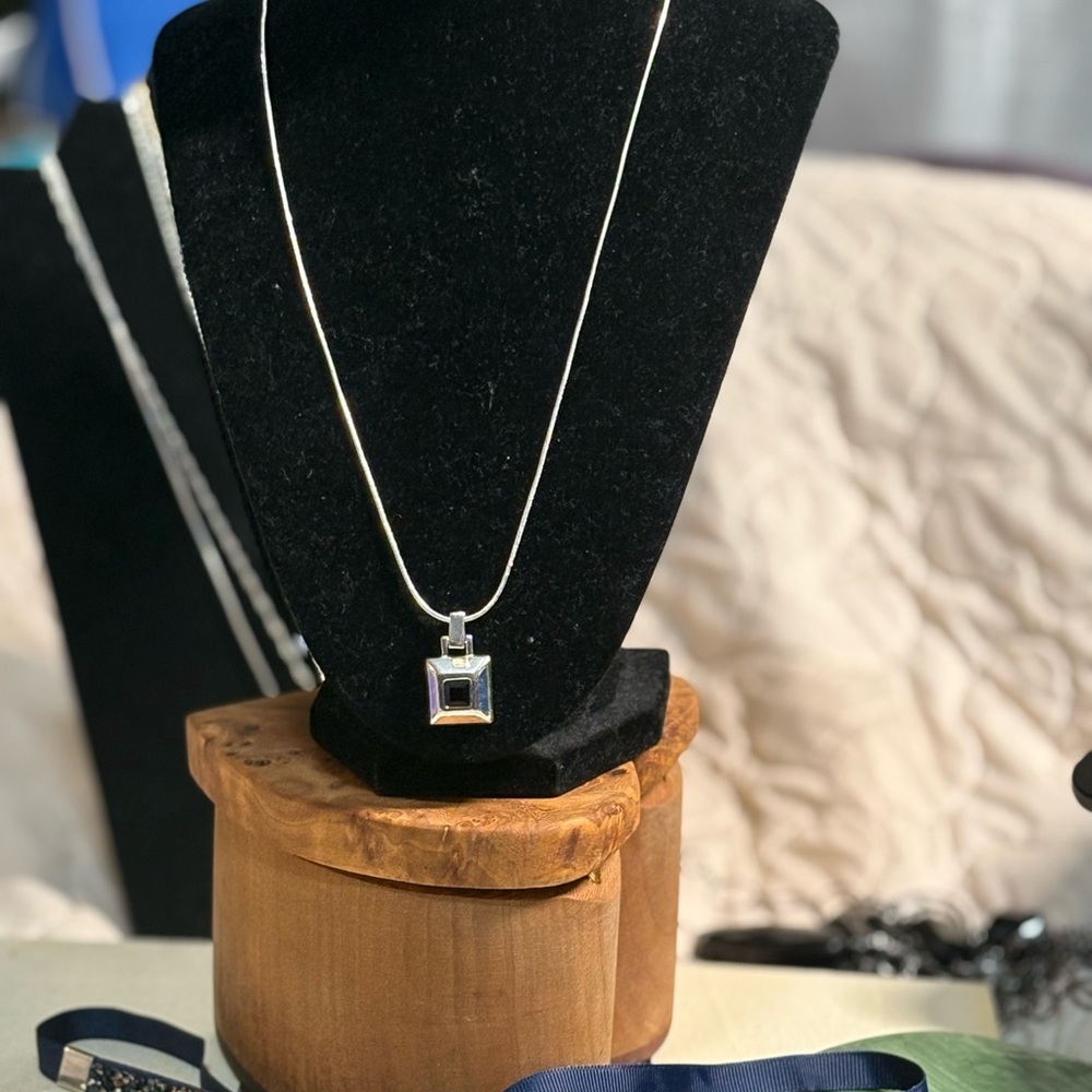 Elegant Silver Necklace with Black Pendant